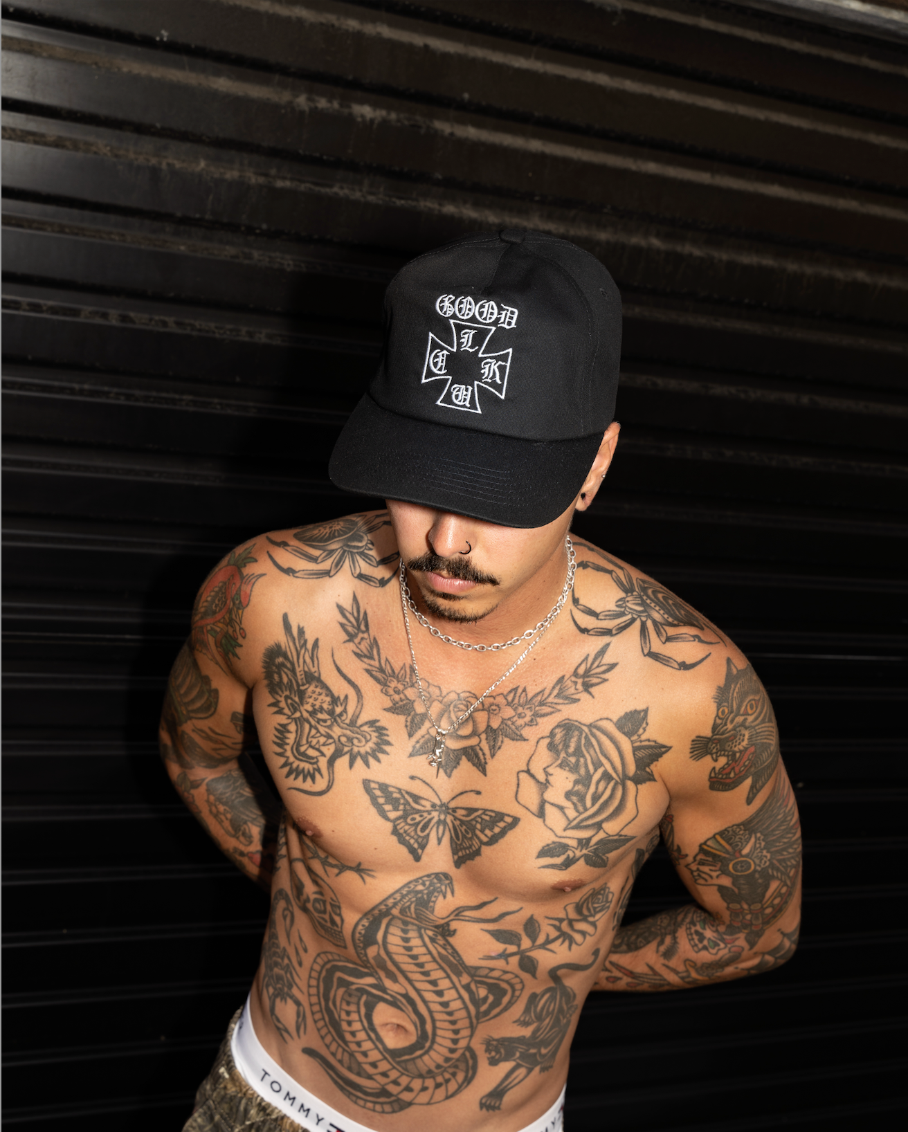 Old E Cross Snap Back